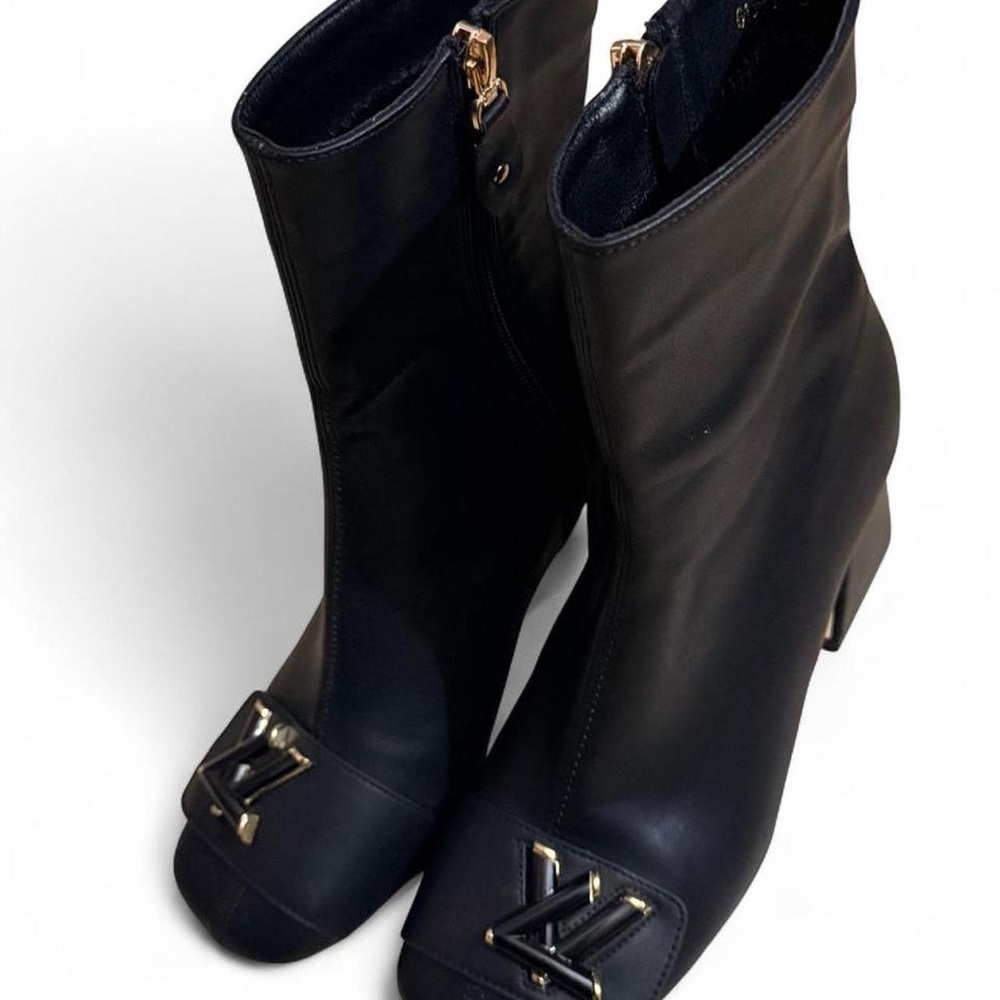L🖤V Black Heeled Boots with gold Accents!